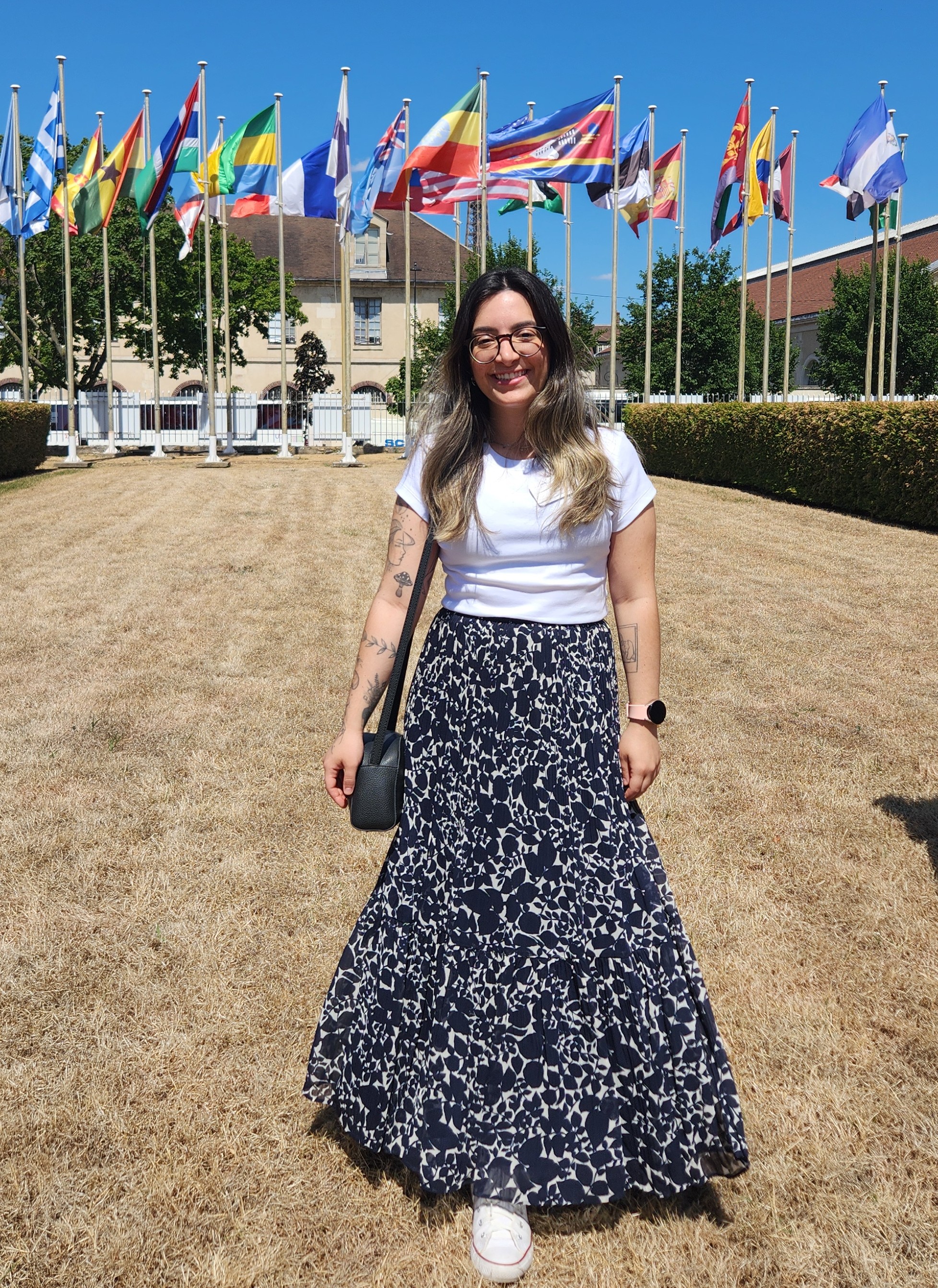 Rafa in front of the flags at UNESCO headquarters